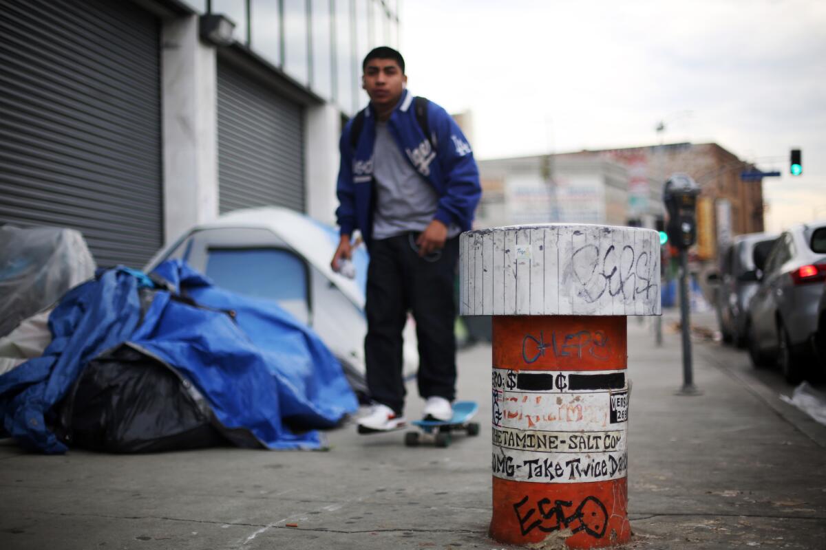 S.C. Mero's untitled pill bottle on 5th Street between Wall Street and Maple Avenue