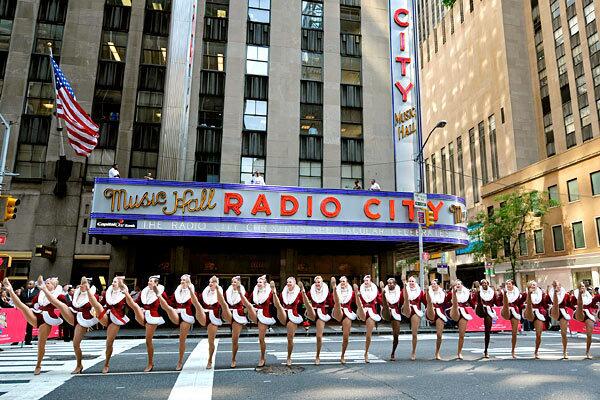 The Radio City Rockettes perform outside Radio City Music Hall in New York City to kick off the sales campaign for the annual Radio City Christmas Spectacular.