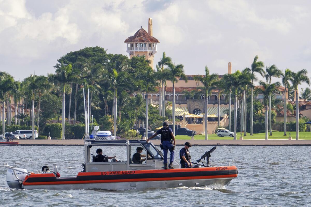 A U.S. Coast Guard patrol boat passes Donald Trump's Mar-a-Lago estate in Palm Beach, Fla.