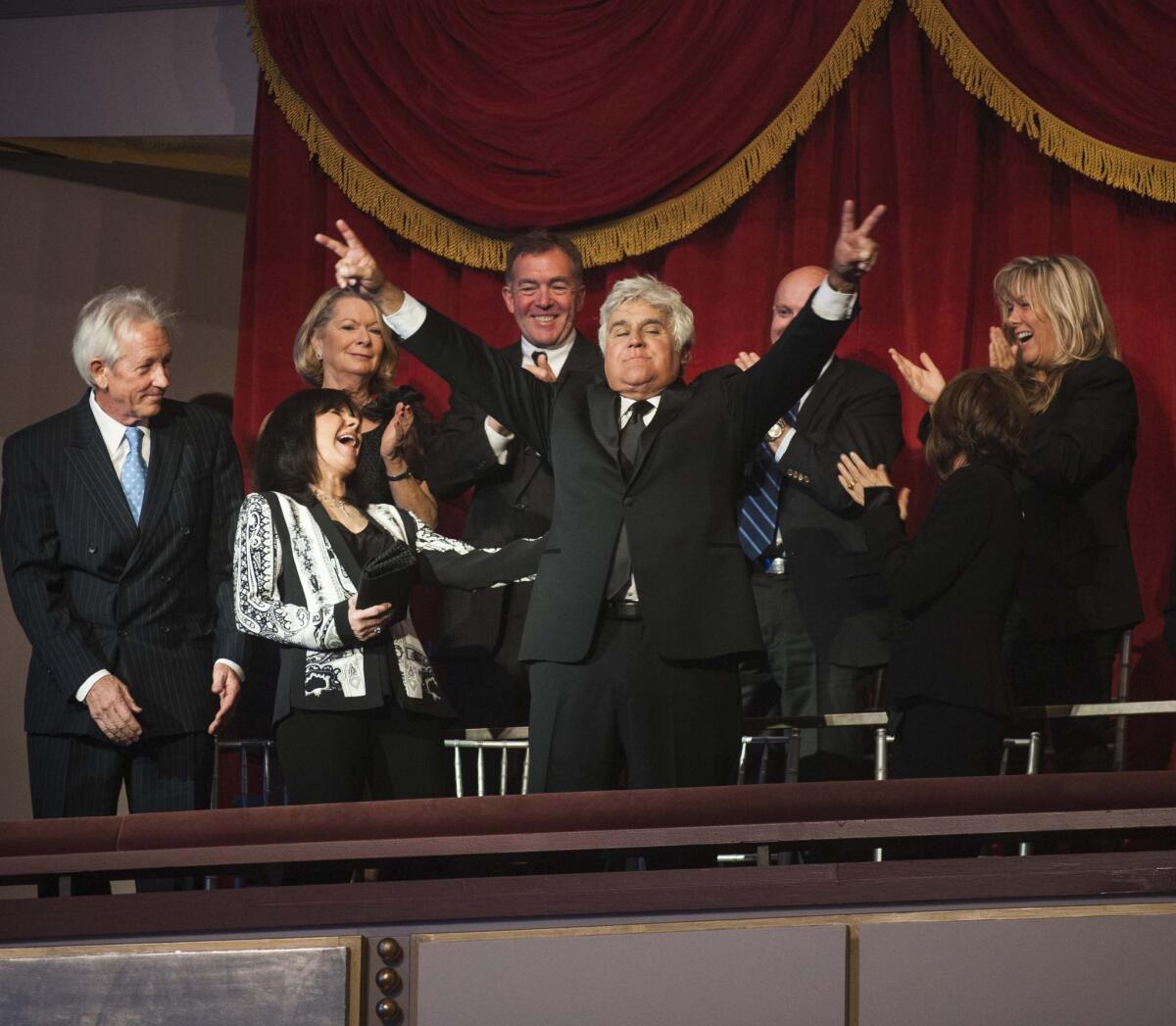 Jay Leno waves to the audience as he is announced at the Kennedy Center during the Mark Twain Prize for American Humor ceremony on Oct. 19.