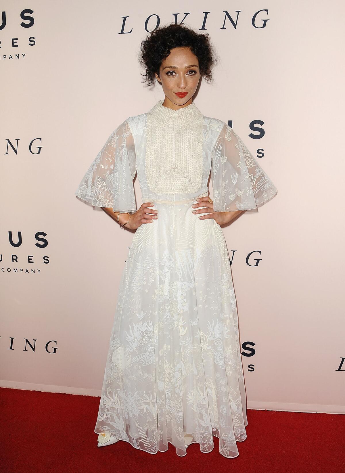 Negga personified retro romance at the Los Angeles “Loving” premiere, wearing a flowing white Valentino with cape sleeves, bib-front and all-over embellishment. (Jason LaVeris / FilmMagic)