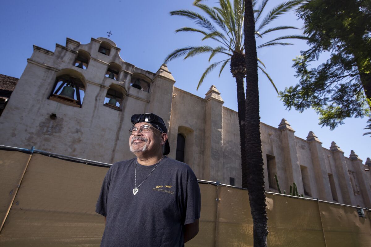 Rudy Najar, 51, stands for a portrait at Mission San Gabriel Arcangel on July 31 in San Gabriel.