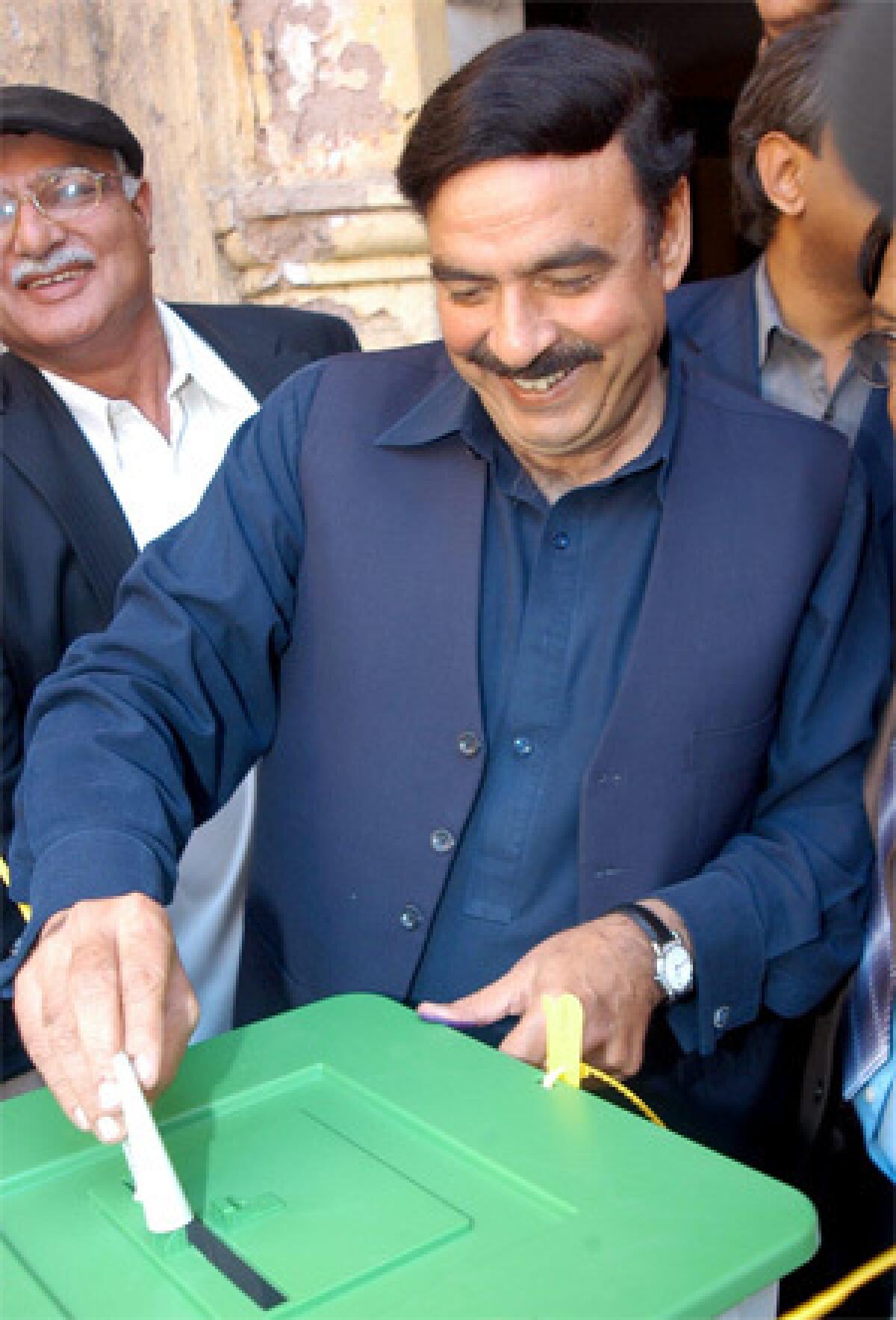 Candidate for National Assembly Sheikh Rashid Ahmed cast his vote today in his district in Rawalpindi. An ally of President Musharraf, he later conceded defeat along with others in his party.