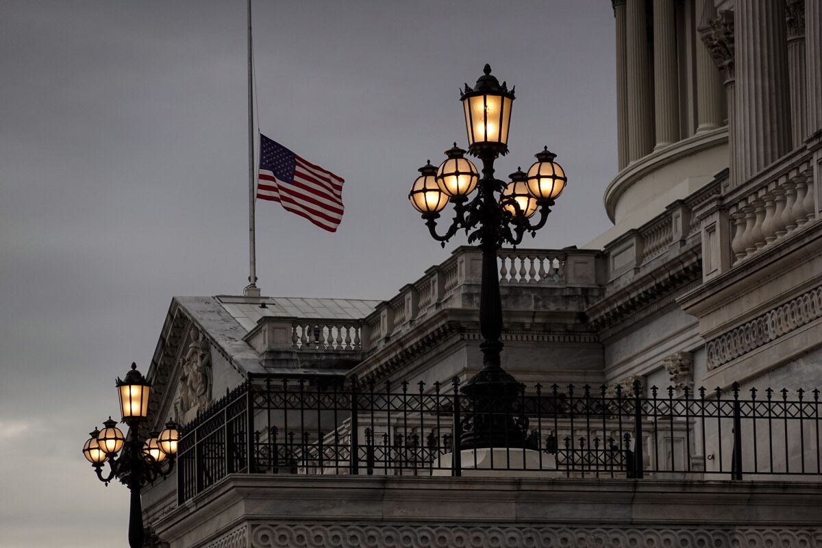 Flag flies at half-staff at the U.S. Capitol in Washington.