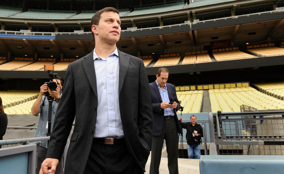 Andrew Friedman, the Dodgers president of baseball operations, looks over the stadium during a press conference Friday.