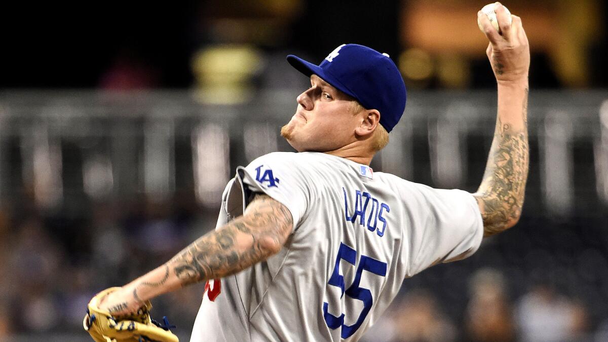 Dodgers starter Mat Latos gave up eight hits and four runs in four innings against the Padres on Thursday night in San Diego.