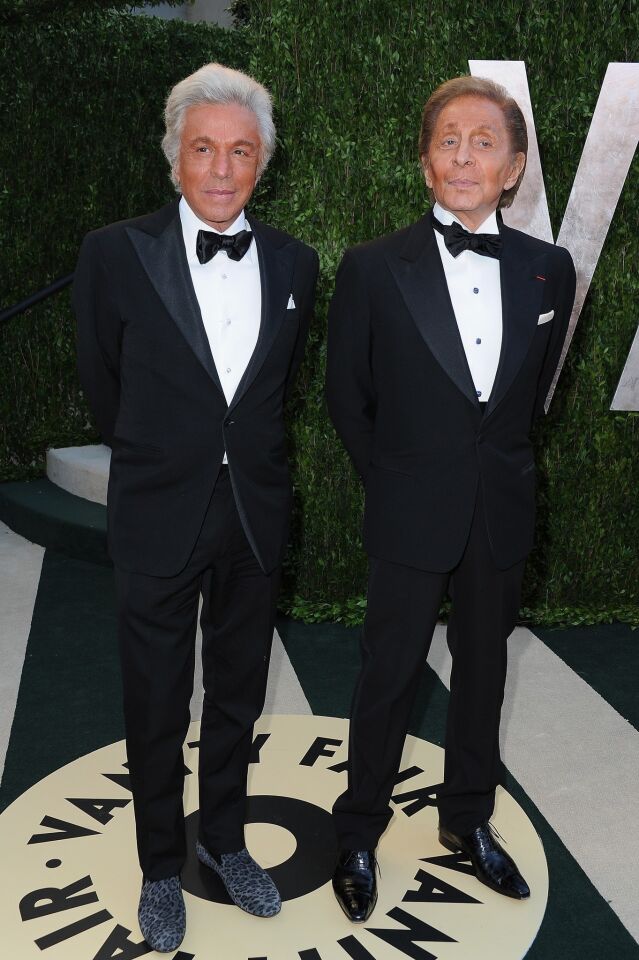 Fashion designer Valentino, right, and Valentino fashion house president Giancarlo Giammetti.