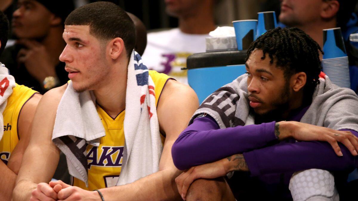 Lakers' Lonzo Ball, left, and Brandon Ingram are sidelined because of injuries and the Lakers are feeling the void.