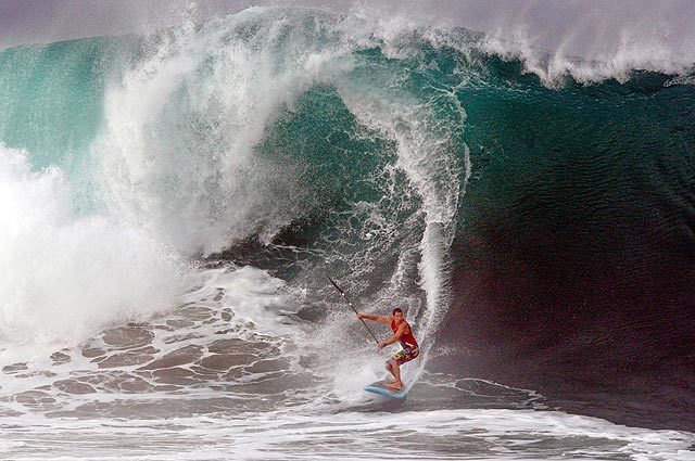 Big waves challenge body boarders and a few brave surfers at the Wedge in Newport Beach. A high-surf warning for Southern California has been issued by the National Weather Service.