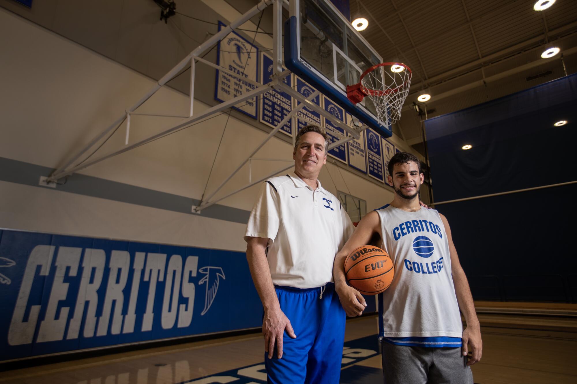 Kade West with coach Russ May at Cerritos College.