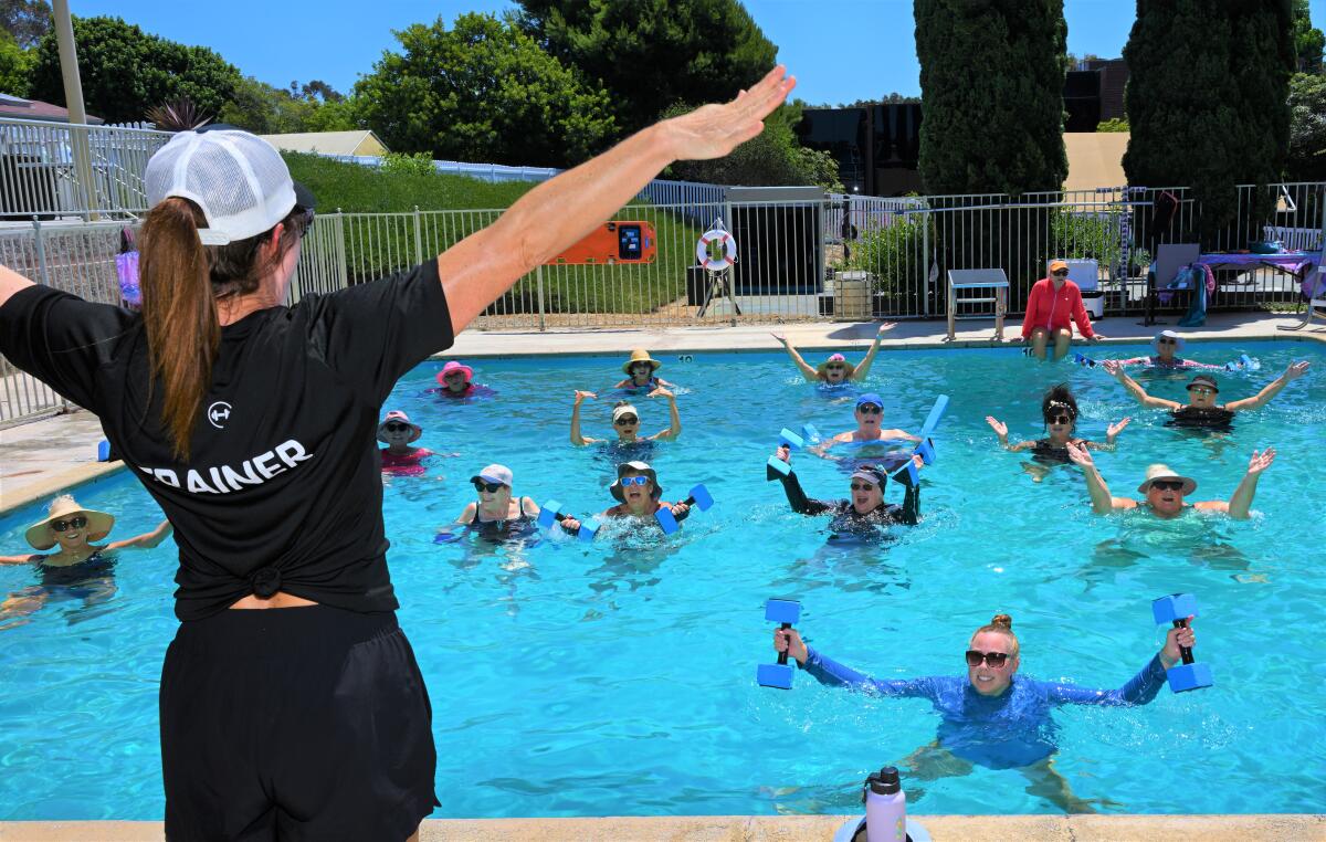 A trainer at the Newport-Mesa Family YMCA leads a group of Mermaids.