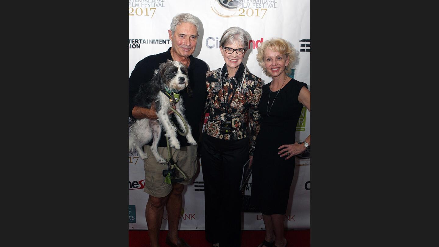 Actor Michael Nouri, with his dog Charlie, Burbank Vice Mayor Emily Gable-Luddy, and The List writer Kristen D'Alessio on the red carpet at the Burbank International Film Festival 2017 opening night screening of "The List" at the Burbank AMC 16 in Burbank on Wednesday, September 6, 2017.