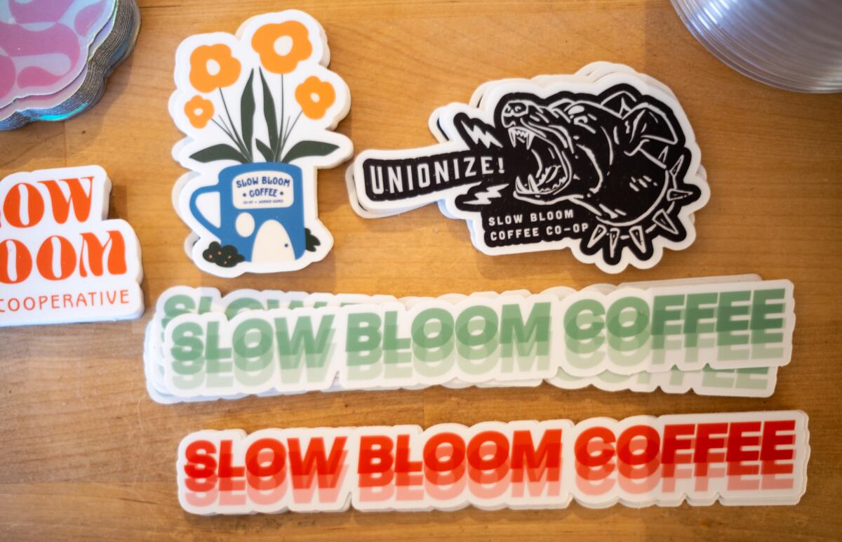 Stickers at the Slow Bloom Coffee Cooperative, a coffee shop 