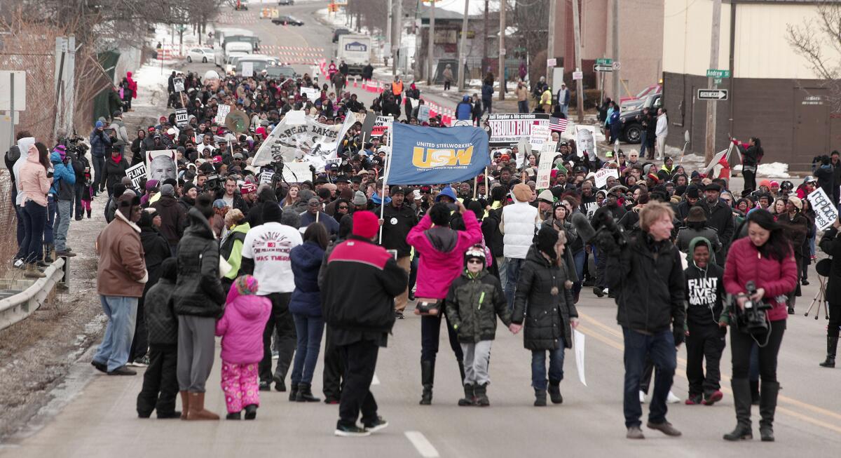 Hundreds participate in a Feb. 19 march to highlight the push for clean water in Flint, Mich.