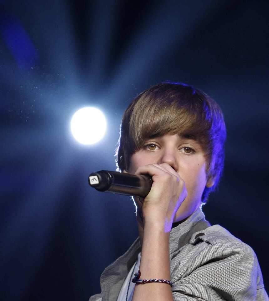 Justin Bieber drives teeny-boppers wild with his long, side-swept hair. The head whipping may have been necessary for him to see out from beneath his overgrown bangs, but it became a signature move for those rocking "The Bieber."