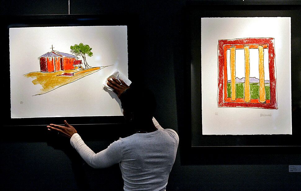 Lithographs by Mandela are displayed as part of an exhibition of his works at Belgravia Gallery in London in July, 2008.