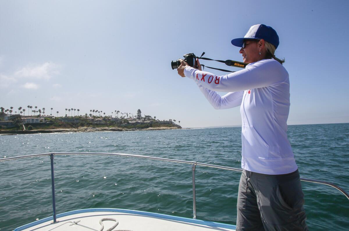 Calla Allison, MPA Collaborative Network director, photographs a boundary line of the South La Jolla marine protected area on August 9, 2019 in San Diego, California. 