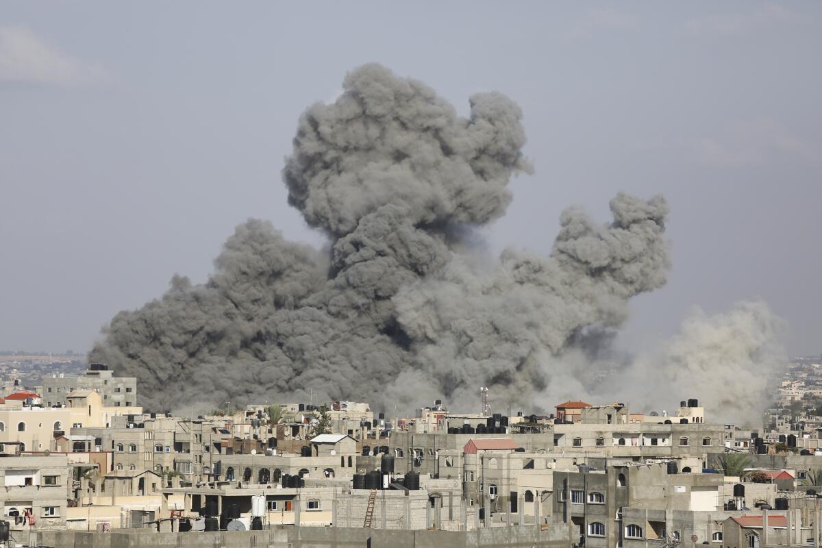 Smoke rises after Israeli airstrikes in Rafah.