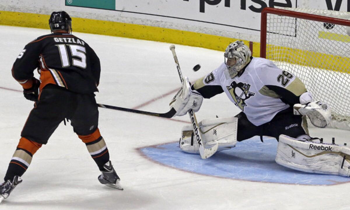 Ducks forward Ryan Getzlaf shoots wide of the net in front of Pittsburgh Penguins goalie Marc-Andre Fleury during the shootout portion of the Ducks' 3-2 loss Friday. The Ducks recently have struggled in shootouts.