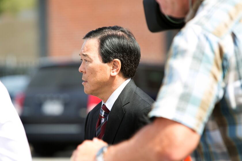 Former Los Angeles County Undersheriff Paul Tanaka leaves the downtown federal courthouse after a jury convicted him on conspiracy and obstruction of justice charges.