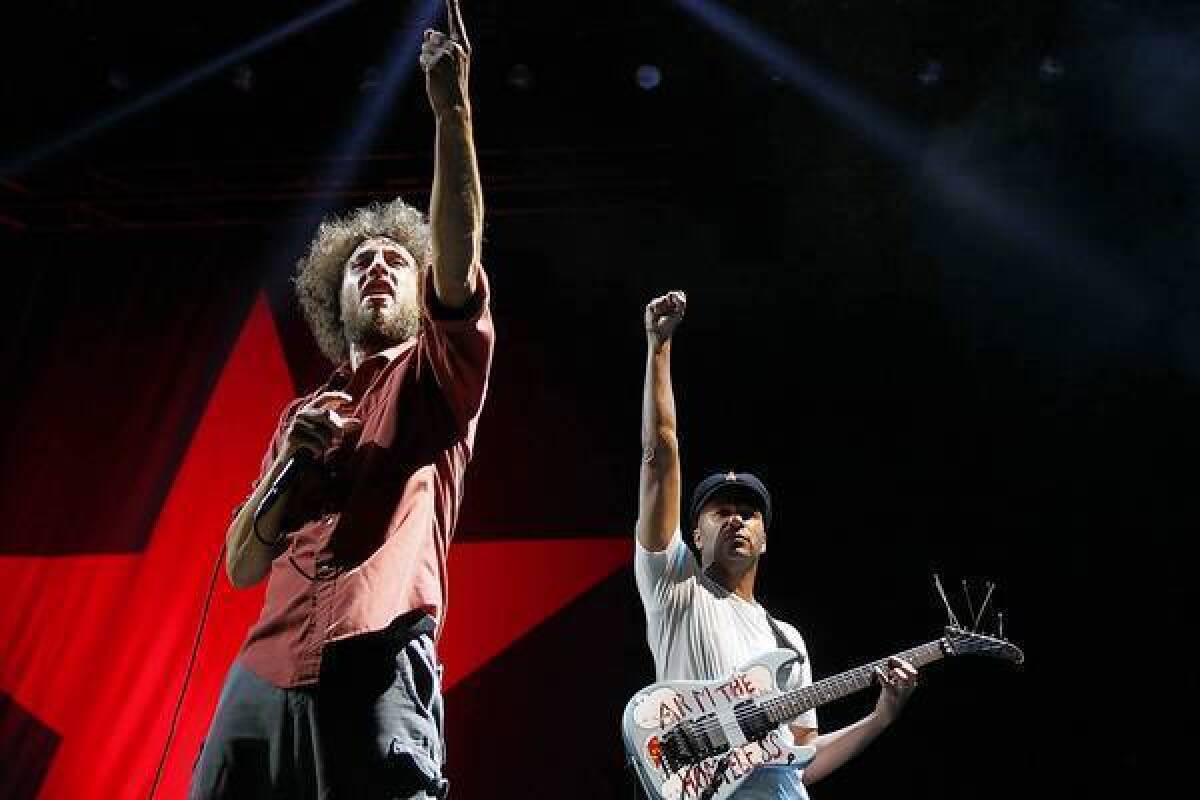 Zack DeLaRocha, left, and Tom Morello of Rage Against the Machine headline the LA Rising concert in July 2011.