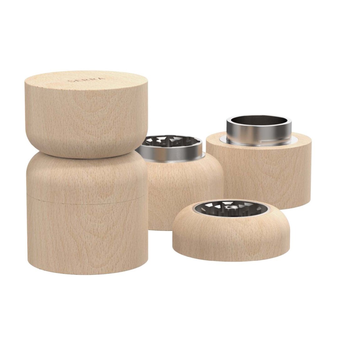 Photo of an artful wooden grinder.