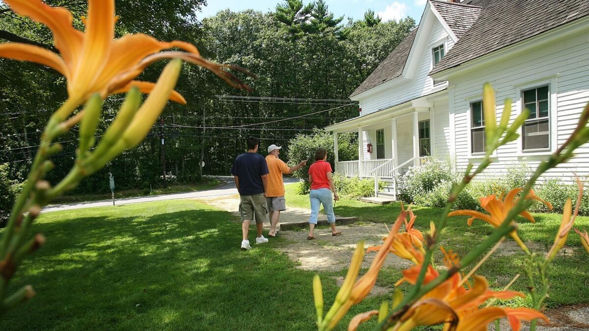 Tourists visit the Robert Frost farm in Derry, N.H. in 2006.