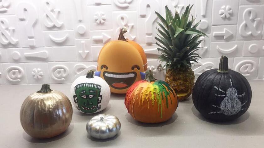 Pumpkins - and a pineapple - decorated for Halloween. (Anthony Tarantino)
