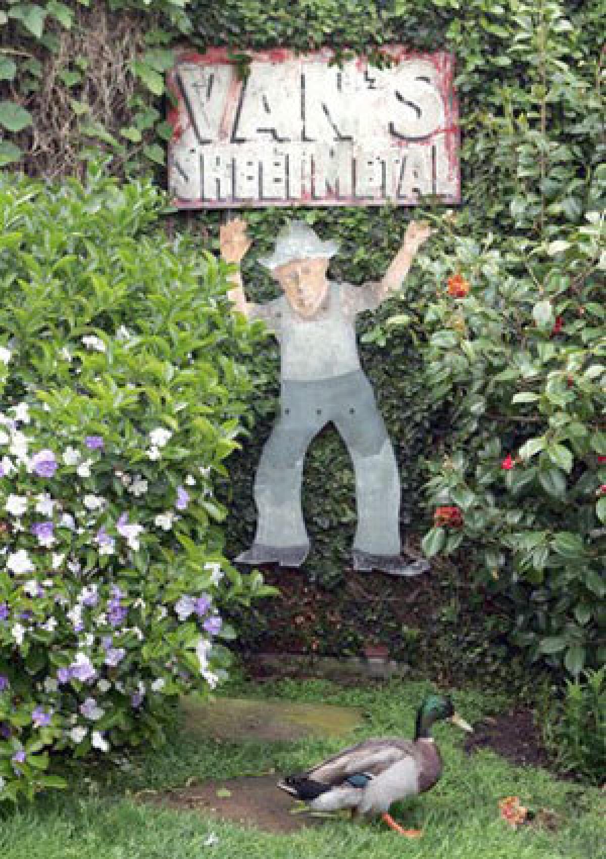 Alley Mills and Orson Bean fill their Venice backyard with retro signs from the past.