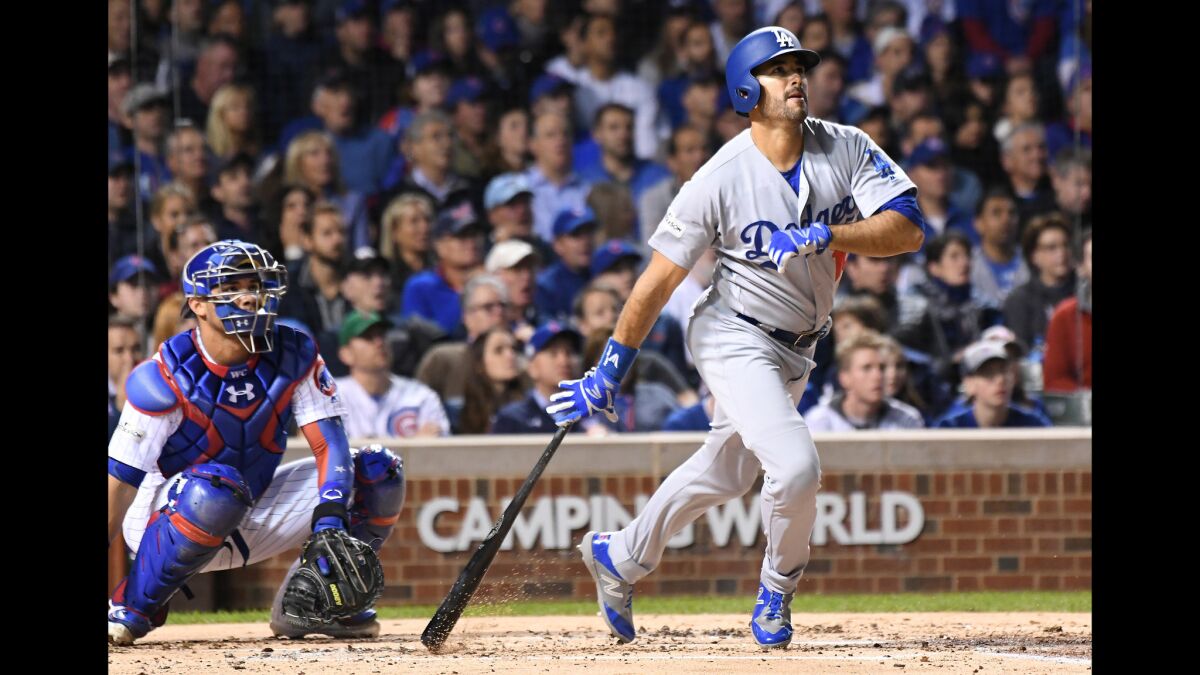 Dodgers Andre Ethier watches as the ball sails over the left field fence for a homerun.