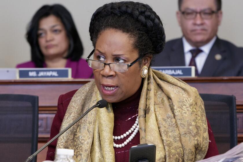 Rep. Sheila Jackson Lee, D-Texas, opposes the Republican health care bill during work by the House Budget Committee, on Capitol Hill in Washington, Thursday, March, 16, 2017. (AP Photo/J. Scott Applewhite)