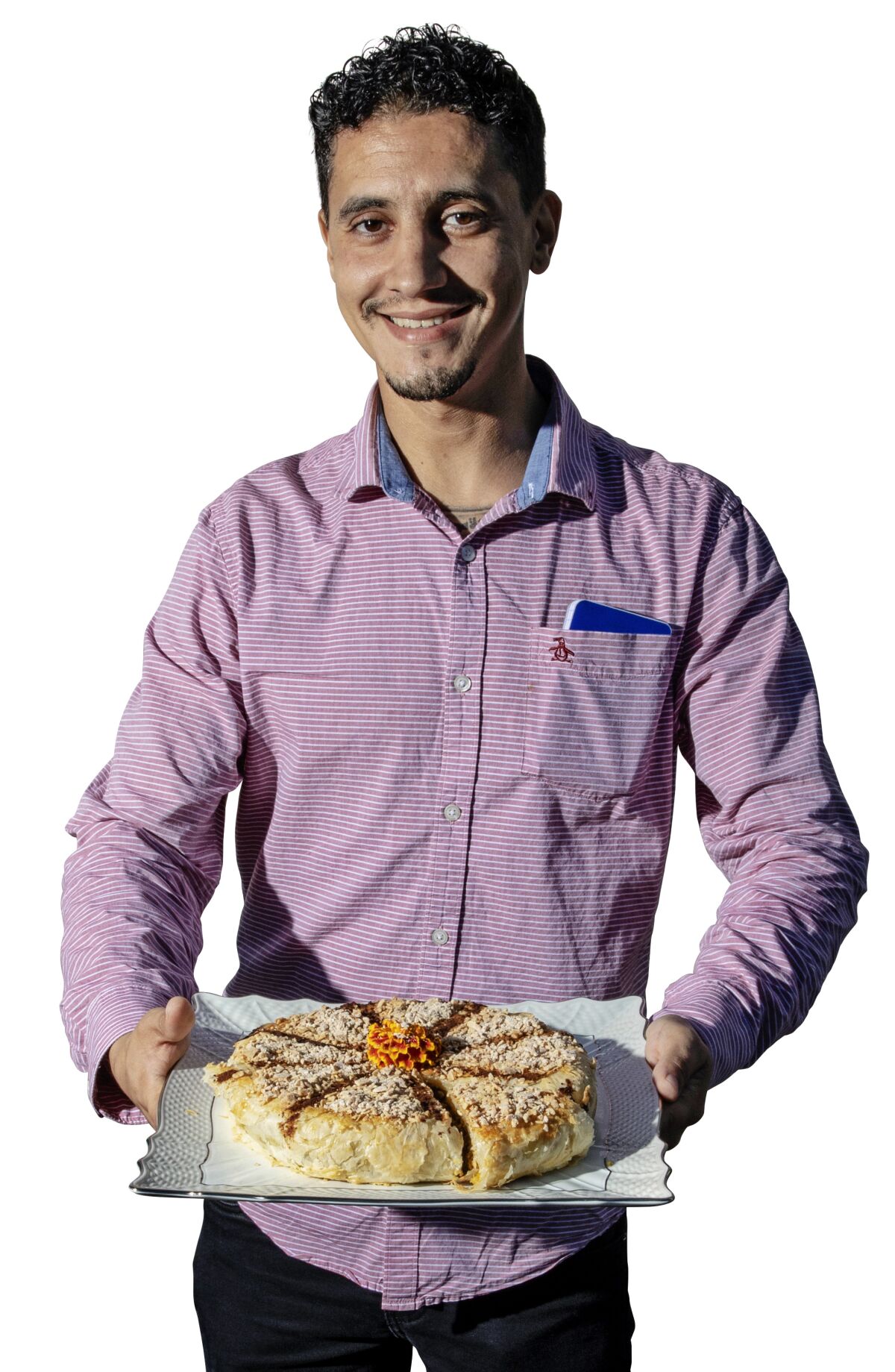 Abdu spent hours on the phone with his mother to re-create her recipe for Chicken Bastilla.