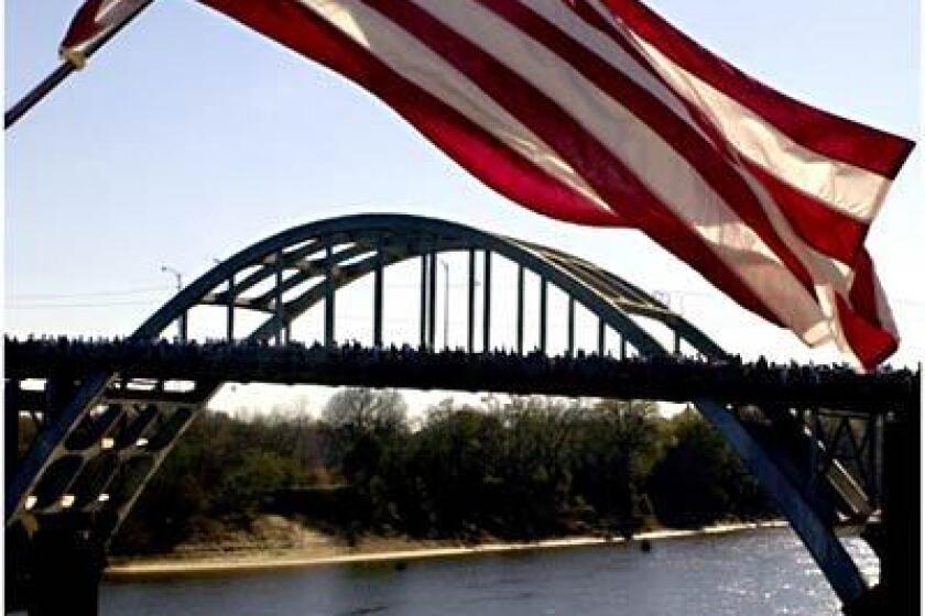 Marchers in 2000 mark the anniversary of the 1965 Bloody Sunday civil rights march on the Selma, Ala., bridge.