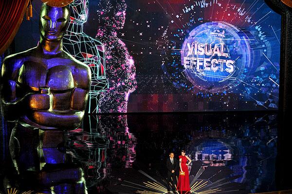 The stage inside the Hollywood & Highland venue is alive with images during presentation of the visual effects Oscar. Ben Stiller and Emma Stone are the presenters.