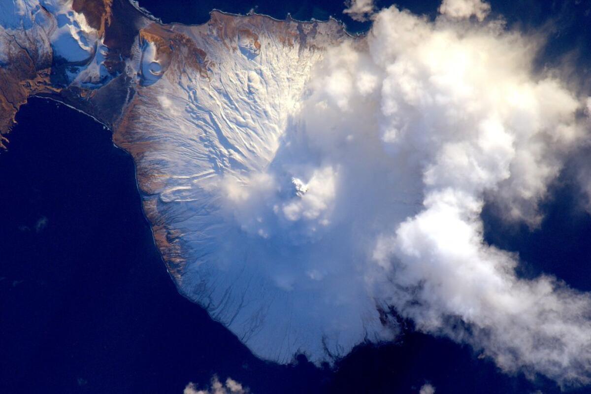 "Aleutian island #volcano letting off a little steam after the new year. #YearInSpace"
