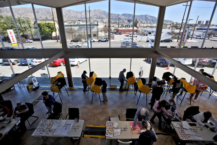 Locals went to vote at IMX Auto Group, at 811 N. Victory Blvd., Burbank on Tuesday, March 3, 2020.