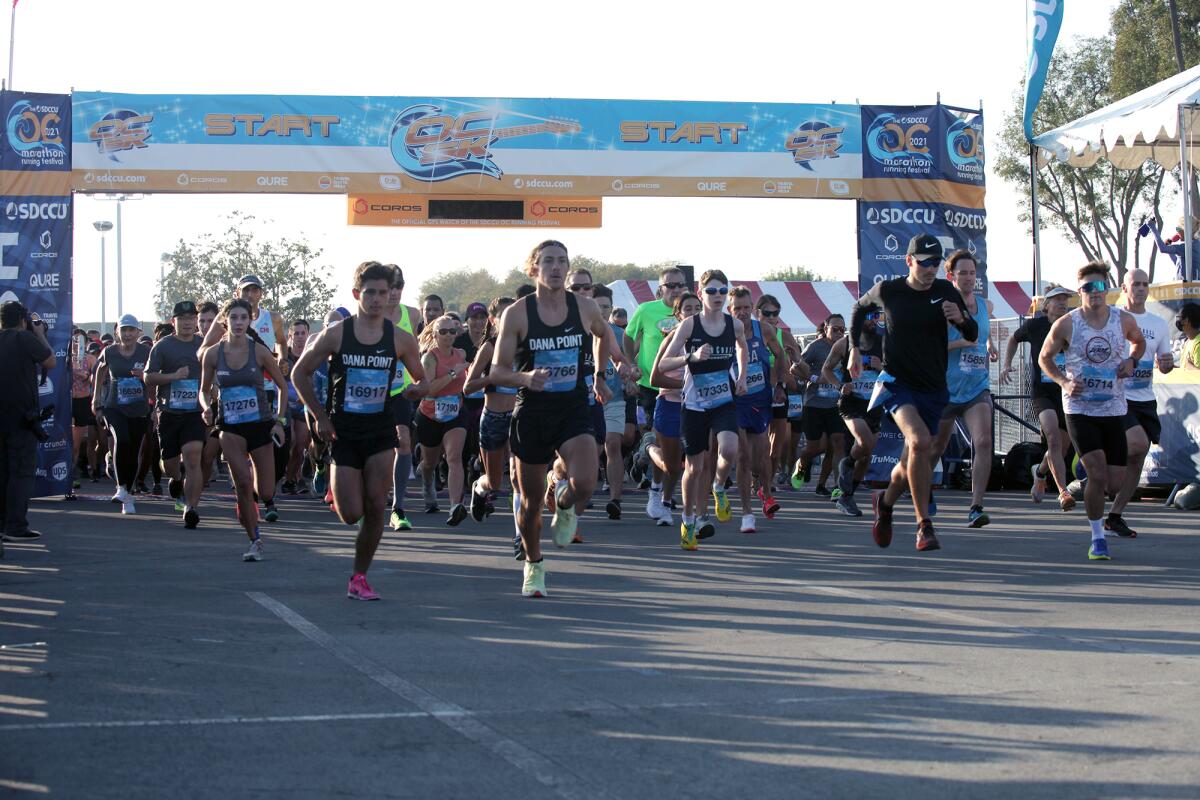 Runners at the start of the Orange County 5K Run/Walk in Costa Mesa on Saturday.