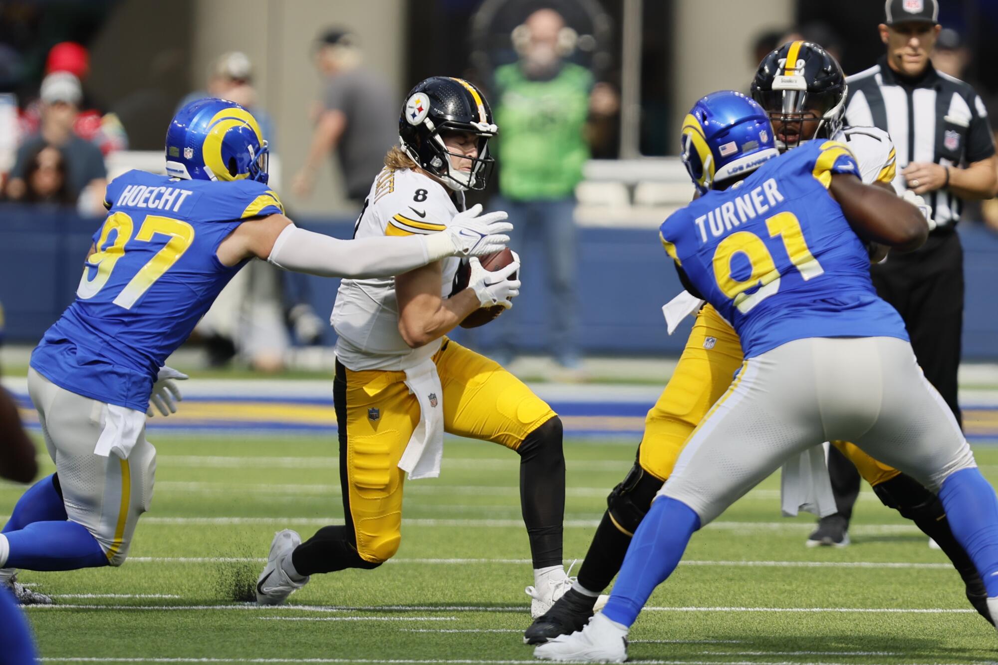 Rams linebacker Michael Hoecht sacks Pittsburgh Steelers quarterback Kenny Pickett at SoFi Stadium.