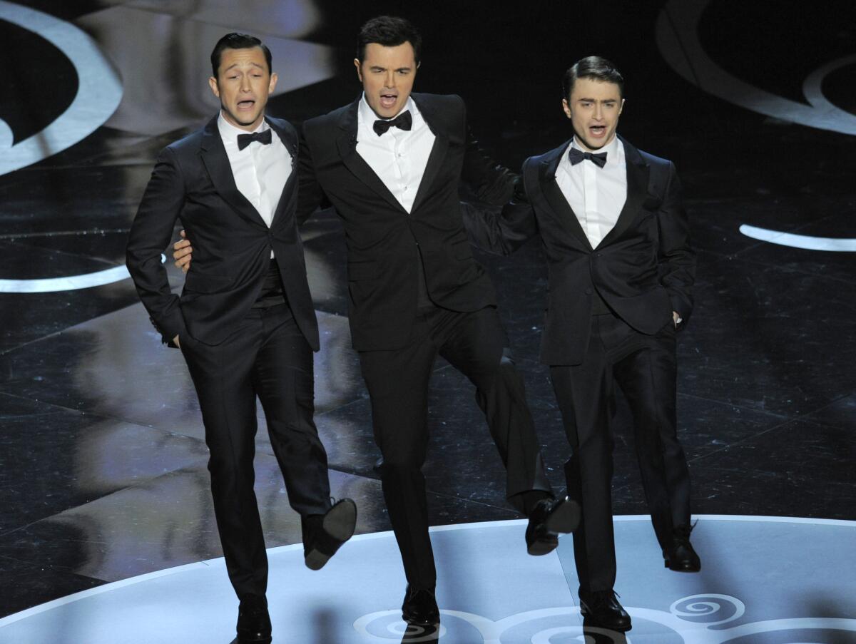Actors, from left, Joseph Gordon-Levitt, host Seth MacFarlane and Daniel Radcliffe perform during the Oscars at the Dolby Theatre on Feb. 24, 2013, in Los Angeles.