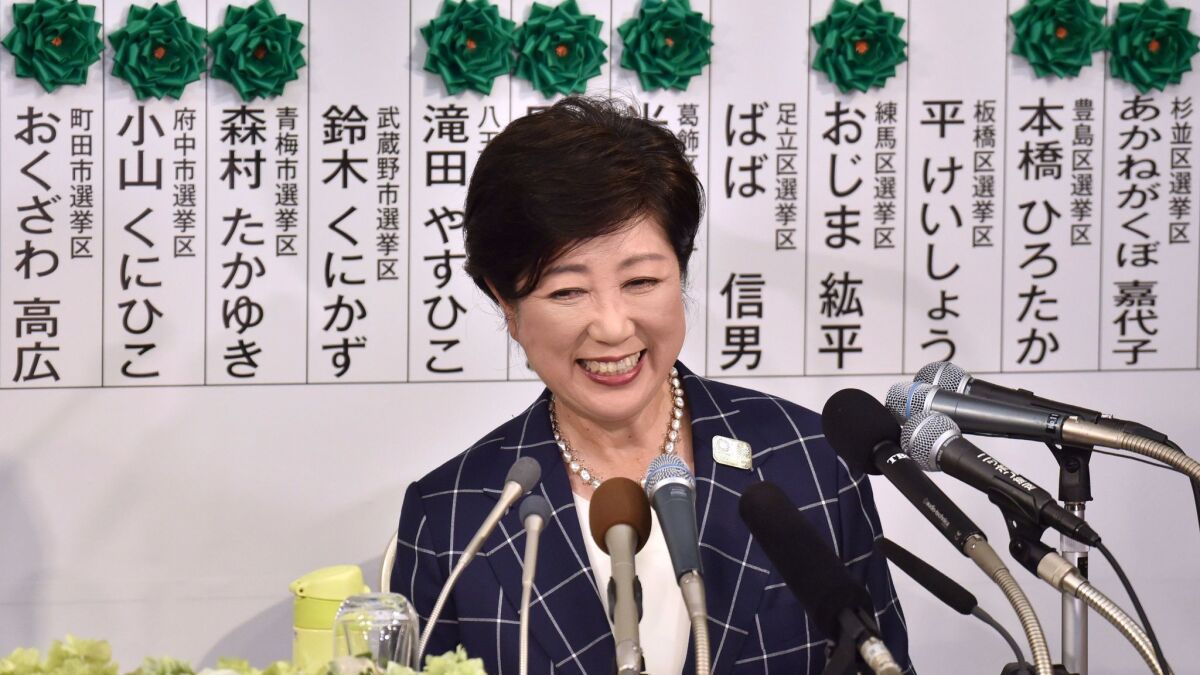 Tokyo Gov. Yuriko Koike, who leads the newly formed Tomin First no Kai (Tokyoites First party), holds a news conference on July 2, 2017, after the Tokyo metropolitan assembly election.