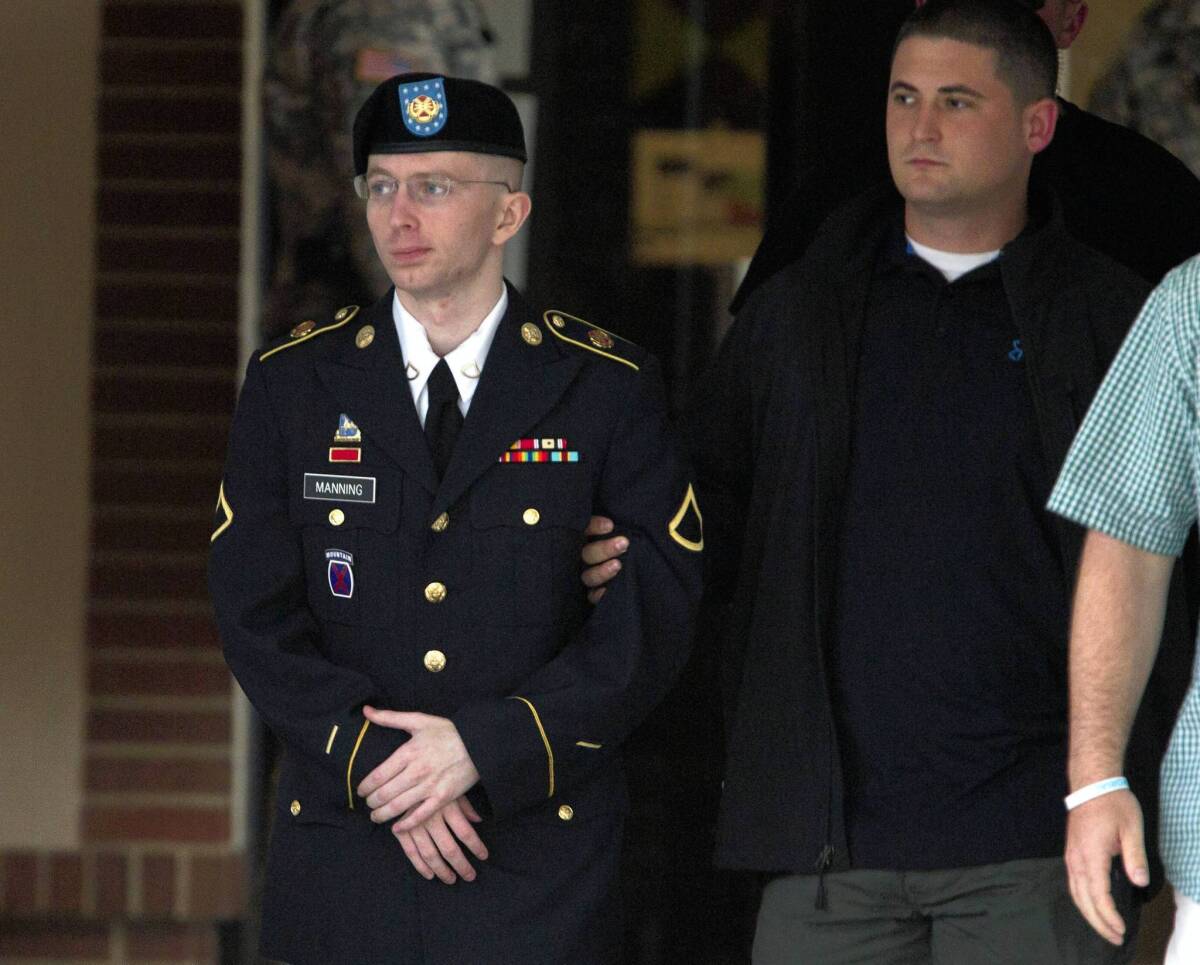 Army Pfc. Bradley Manning, being escorted out of a courthouse Monday, "was our best analyst by far," a onetime supervisor said.