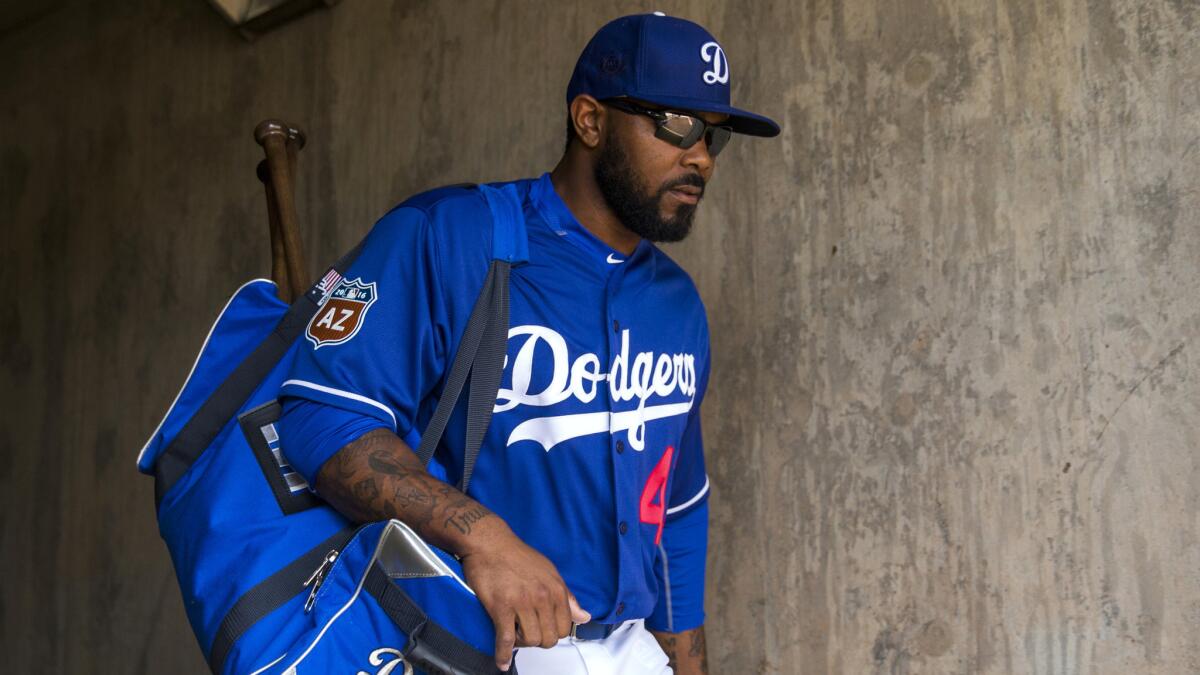 Dodgers second baseman Howie Kendrick gets ready for a spring training game earlier this spring.