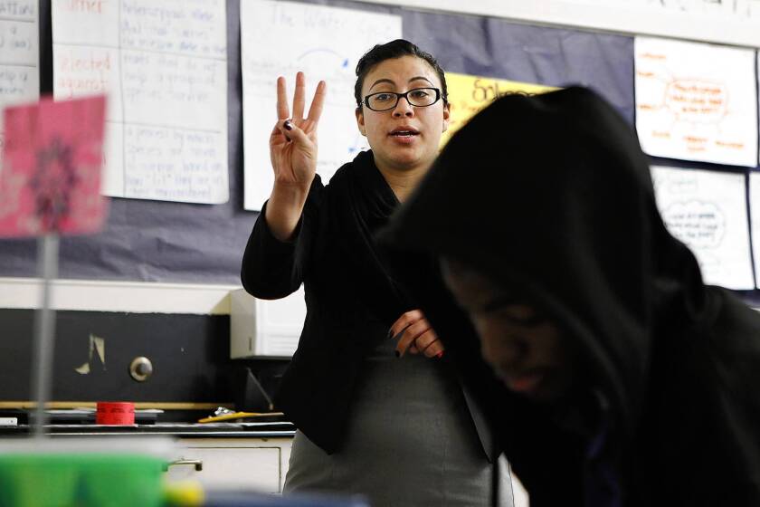 Stephanie Silva is a Teach for America instructor at Manual Arts High School in Los Angeles. Interns like her will be allowed to teach students struggling with English only under stricter state controls over their training and supervision, the state Commission on Teacher Credentialing unanimously decided Thursday.