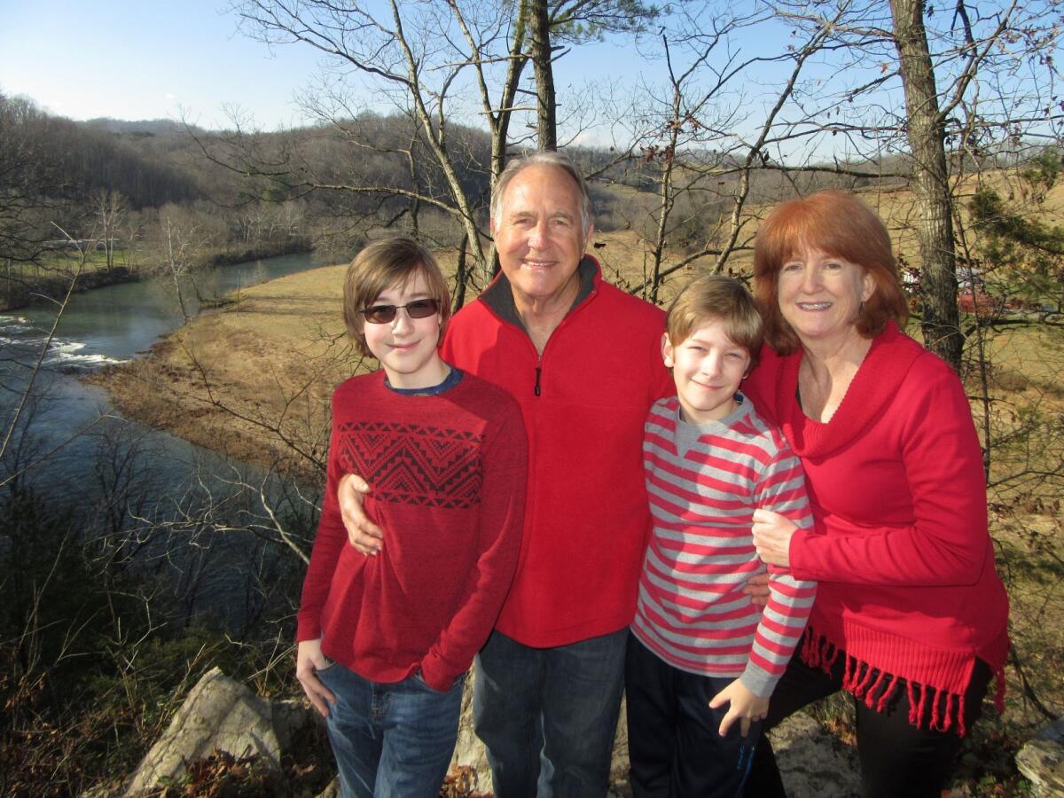 From left, Jamie, Michael, Ian and Gaye Johnson pose for their 2020 holiday photo.