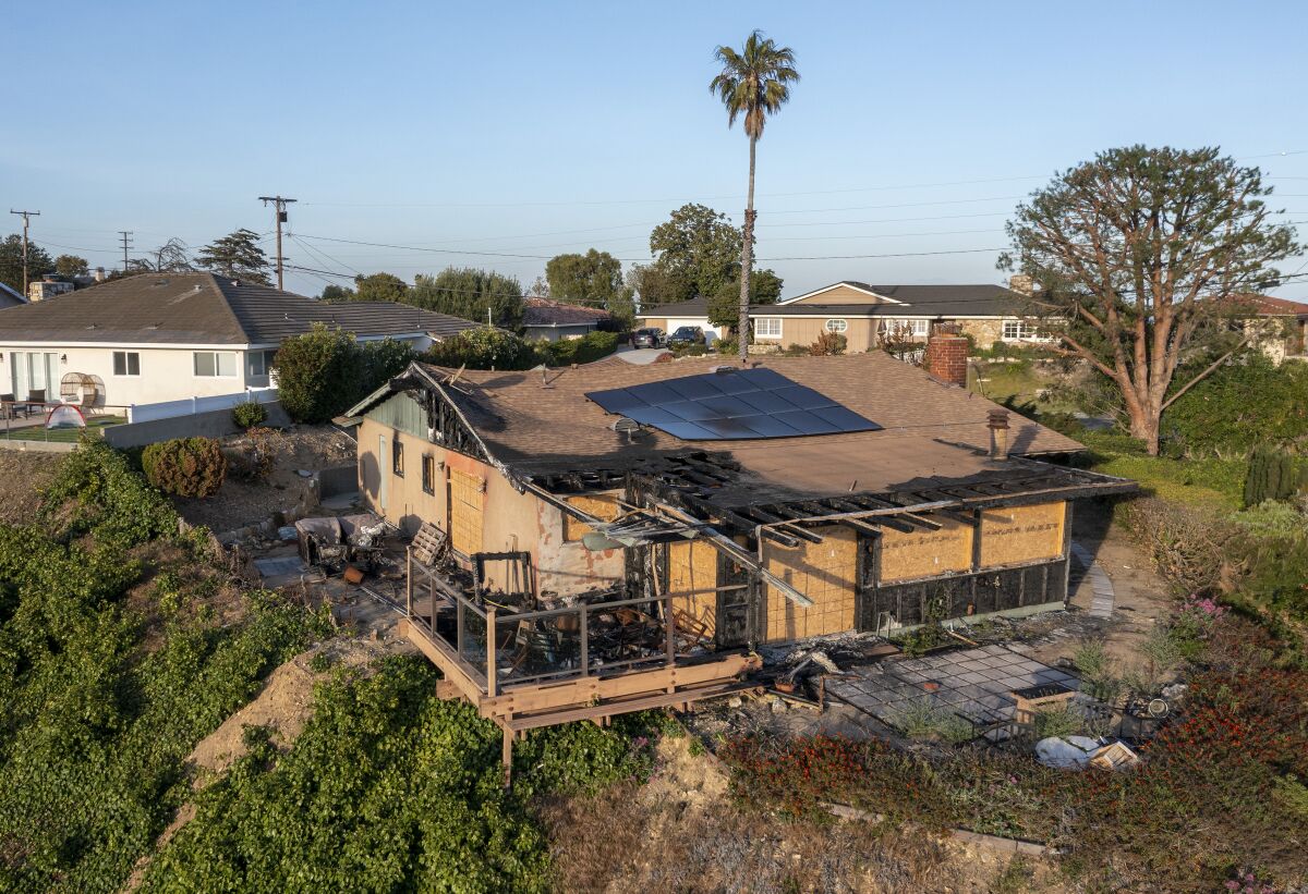  Aerial view of a burned home on Tarapaca Road in Rancho Palos Verdes.