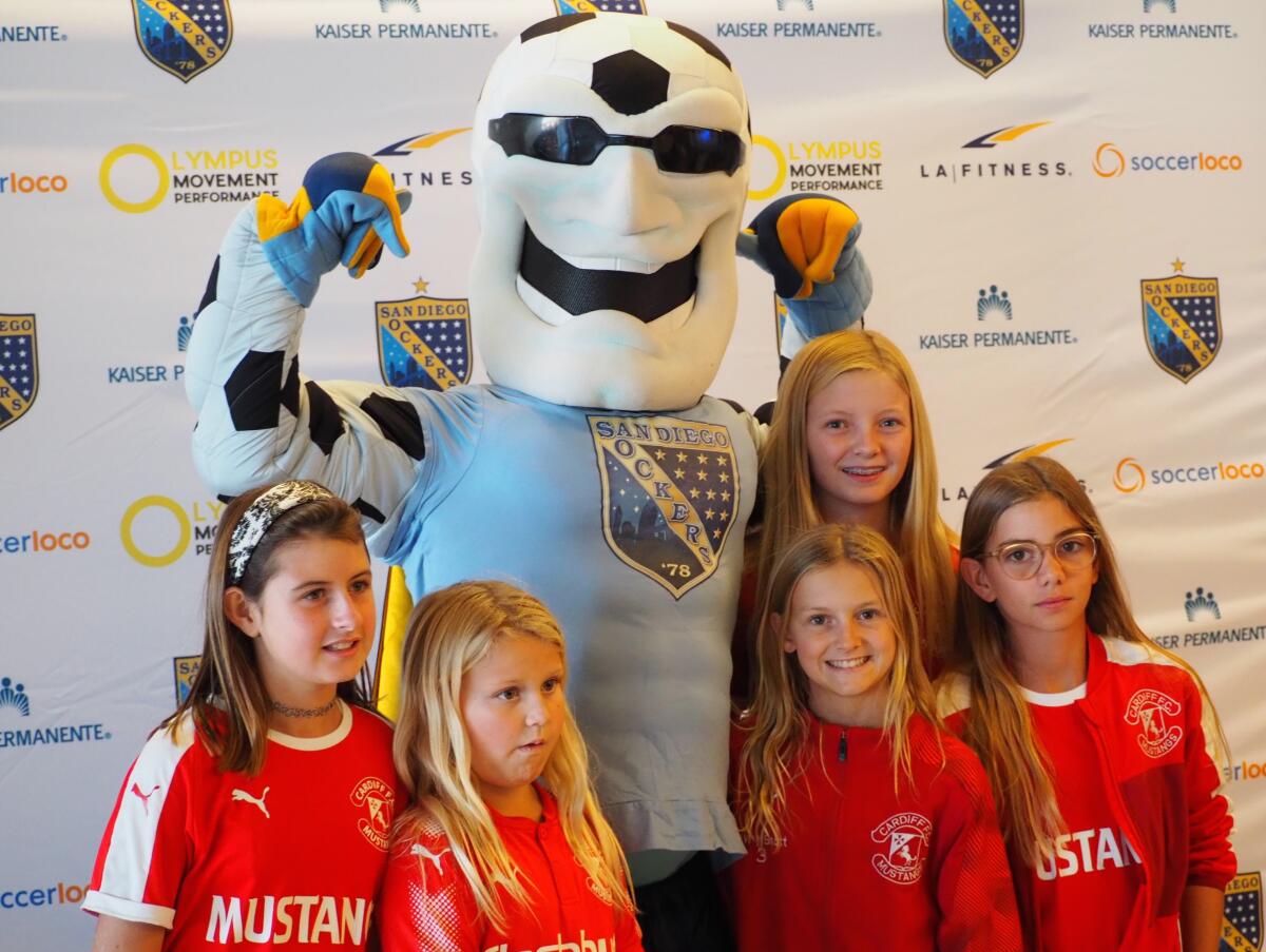 Cardiff Mustangs players joined the pregame ceremony at the Sockers season opener Nov. 24.