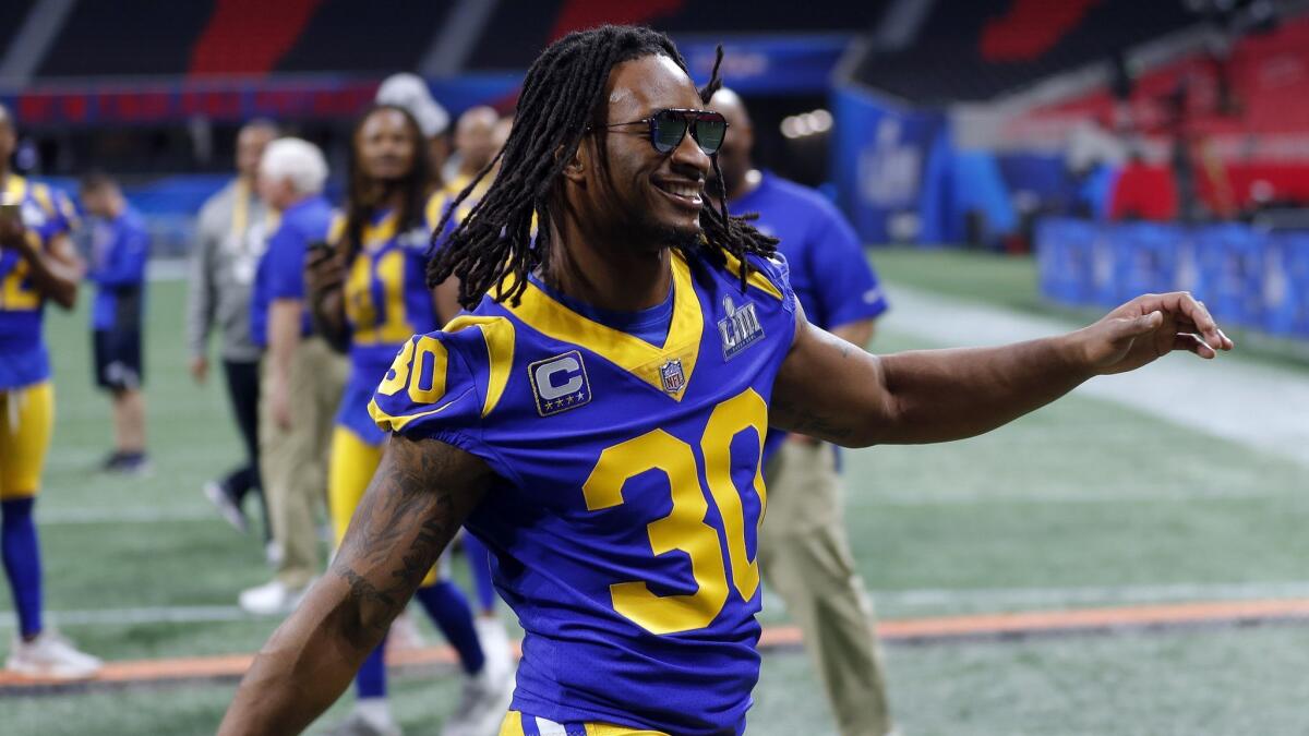 Rams running back Todd Gurley enjoys a light moment during a walk-through for Super Bowl LIII in February in Atlanta.