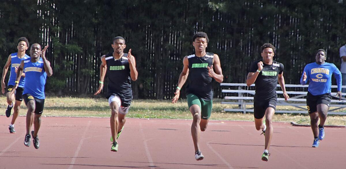 Dorsey sprinters competing against Crenshaw in a dual meet this season.