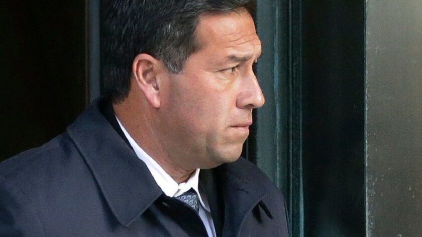 Former UCLA soccer coach Jorge Salcedo departs federal court in Boston, where he was charged with participating in a nationwide college admissions bribery scandal, on March 25, 2019.