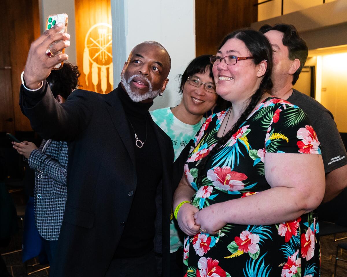 LeVar Burton takes a photo with Times readers at May 24 L.A. Times Book Club on State of Banned Books.